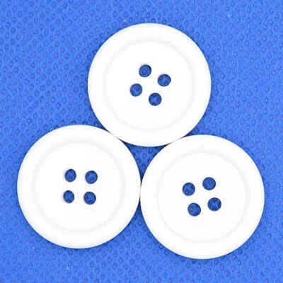 WHITE 4 HOLE RIM CLOWN BUTTONS Diameter 23mm - Image 1 of 2