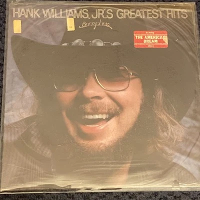 HANK WILLIAMS JR’S GREATEST HITS 1982 VINYL LP Shrink Wrap W/Hype Sticker VG+ - Image 1 of 2