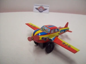 Avión de chapa 575, accionamiento por fricción, años 60, Made in W. Germany - Imagen 1 de 6
