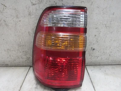 LUZ TRASEIRA 2099 TOYOTA LAND CRUISER Lh lente fabricante de equipamento original rachada - Imagem 1 de 4