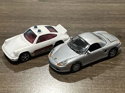 PORSCHE BOXTER R/C SILVER 1999 + CORGI JUNIORS PORSCHE CARRERA POLICE(2) CAR LOT - Image 1 of 4