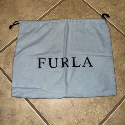 Auténtico bolso de ropa Furla azul claro 13 X 10 Foto 1 de 4