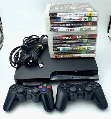 Sony PlayStation 3 PS3 Slim 160GB Console With Two Controllers + 11 GAMES - image 1 of 4
