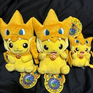 Pokemon Center Mega Tokyo Pikachu Plush Set Charizard Poncho w/tag - Picture 1 of 1