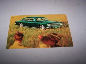 1966 FORD FALCON FUTURA 4 DOOR SEDAN Postcard - Picture 1 of 2