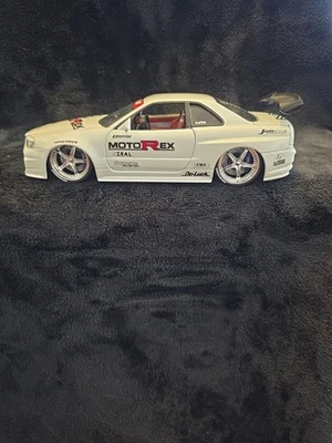 Jada Toys 1:24 Import Racer Nissan Skyline R34 GTR White Do Luck MotoRex RARE - Image 1 of 4