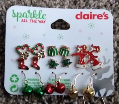 Juego de 9 Pendientes Claire's Campanas de Navidad Árbol Copo de Nieve Reno Sombrero Calcetín Foto 1 de 2