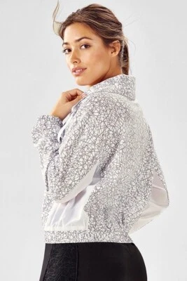 FABLETICS Nuevo! Chaqueta reflectante blanca "Layla" cremallera completa cuello embudo nueva sin etiquetas talla M Foto 1 de 4
