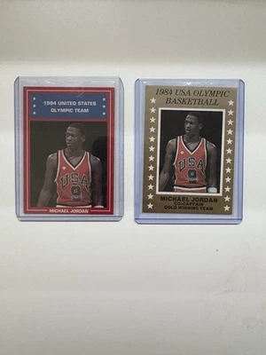 1984 (2) Equipe Olímpica de Basquete dos EUA Michael Jordan OURO/RARO VERMELHO E AZUL..  - Imagem 1 de 2