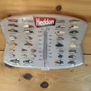 NEW Famous Heddon Fishing Lures  Embossed Metal Thermometer Wall Decor 14”x9” - Picture 1 of 7