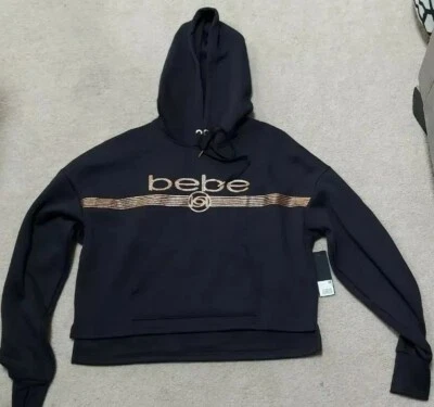 SUDADERA CON CAPUCHA BEBE SPORT TALLA PEQUEÑA CON LOGOTIPO DORADO BRILLO  Foto 1 de 4