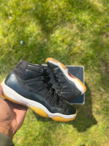 Jordan 11 retrò nero e rosso UK7
