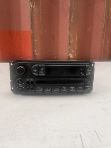 1999-2004 Jeep Grand Cherokee Dodge Dakota Radio Unit Used OEM P05064354A1 - Picture 1 of 9