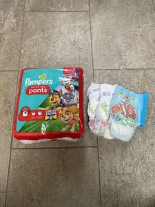 24 Pampers Baby Dry Pants Windeln Größe 4 (9-15 Kg) + 3 Schwimmwindeln - Bild 1 von 5
