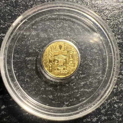 Ronda encapsulada Anhk escarabajo egipcio monarca oro puro .9999 de 1/200 oz. Foto 1 de 2