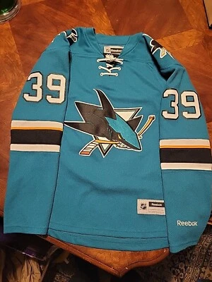 Jersey Logan Couture Reebock (W pequeño) Foto 1 de 3