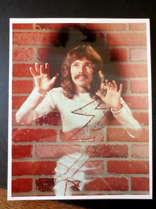 Doug Henning Famous Magician coming thru a brick wall. 8x10 color picture . - Picture 1 of 1