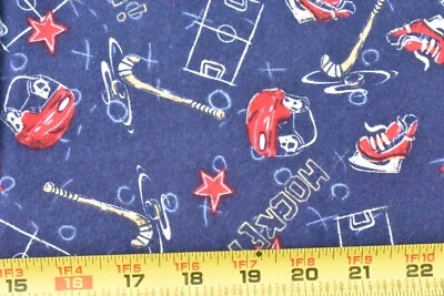 Por 1/2 yarda, tema de hockey rojo y azul en franela azul marino, Jo-Ann, E97 Foto 1 de 4