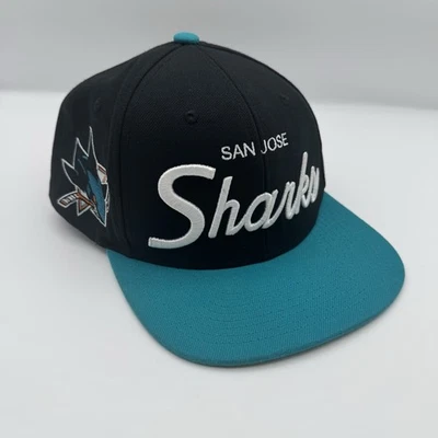 San Jose Sharks Mitchell And Ness NHL Negro N Teal Snapback Sombrero Script Foto 1 de 4