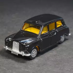 CORGI London Taxi Austin FX4 1/64 Yellow Interior Vintage Diecast Model Car - Imagen 1 de 8