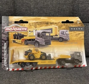 Miniature Majorette Volvo FMX Low Bed Trailer camion remorque, tractopelle 1/87 - Foto 1 di 5