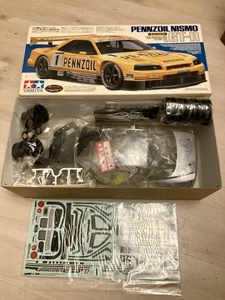 NUEVO 58239 TAMIYA VINTAGE 1/10 RC TA03F TA03 NISSAN PENNZOIL R34 GT-R KIT ESPECIAL - Imagen 1 de 12