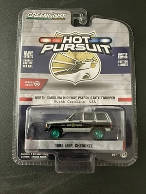Greenlight GREEN MACHINE North Carolina Highway Patrol Police Jeep Cherokee 1/64 - Image 1 of 3