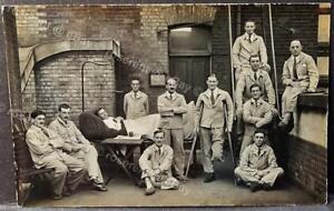 WW1 Wounded Soldiers in a Hospital Yard " Do Not throw rubbish " Real Photo PPC