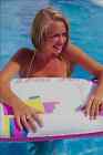 783025 Girl With Innertube In Pool Ibiza Spain A4 Photo Print