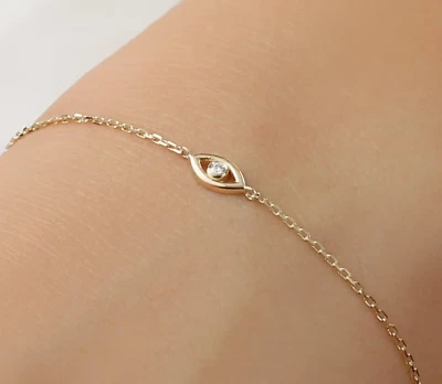 Pulseira corrente feminina folheada a ouro amarelo 14K diamante real olho mau 0,10 quilates - Imagem 1 de 4