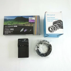 Kit filtro Vivitar accessori fotocamera 49 mm prolunga automatica tubo set caricatore obiettivo - Foto 1 di 6