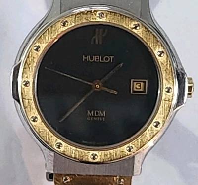 HUBLOT MDM GENEVE CUARZO ORO AMARILLO 18K Y ACERO 28MM REF. 1391,2 con CAJA Y PAPELES Foto 1 de 4