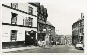 REAL PHOTOGRAPHIC POSTCARD OF THE BULL HOTEL & CORVE STREET, LUDLOW, SHROPSHIRE - Picture 1 of 2