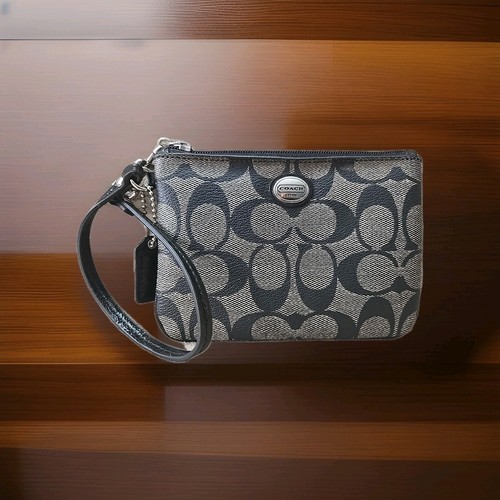 Portafoglio piccolo Coach con logo firmato da polso nero PVC