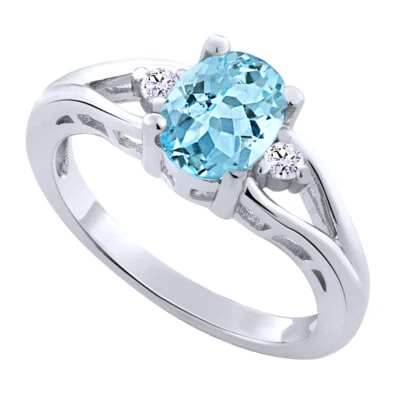 1.80 Ct Oval Swiss Blue Topaz & White Topaz Ring in 14K White Gold Plated Silver - Image 1 of 4