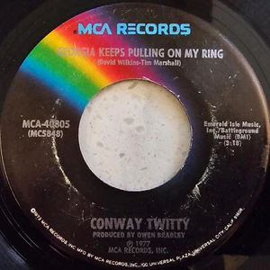 Conway Twitty – Georgia Keeps Pulling On My Ring - 1977 - 7" - Picture 1 of 6