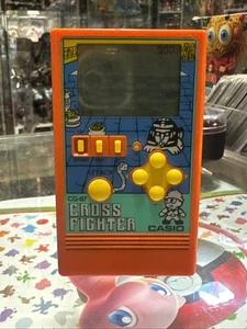 Casio CG-87 cross fighter console FUNZIONANTE gioco vintage usato lotta - Imagen 1 de 5