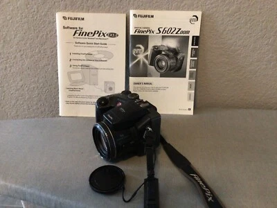 Fujifilm FinePix Digital Camera S602 Zoom Black 3.1 MP 6x Optical Zoom Lens Cap - Image 1 of 4