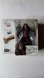 Nuovo seghetto Neca Cult Classics serie 5 - jigsaw killer mascherato con triciclo pupazzo - Foto 1 di 2