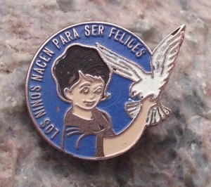 Distintivo spilla colomba pace spagnola slogan nascono per essere felici vintage bambini - Foto 1 di 2
