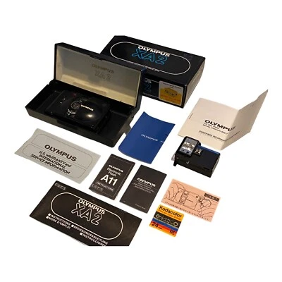 Olympus XA2 35mm Rangefinder Film Camera with A11 Flash Box Paperwork Untested - Image 1 of 4