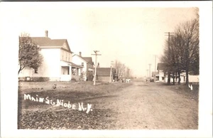 NIOBE, NEW YORK : MAIN STREET : DIRT ROAD SCENE : RESIDENTIAL : RPPC : 1911 - Picture 1 of 5