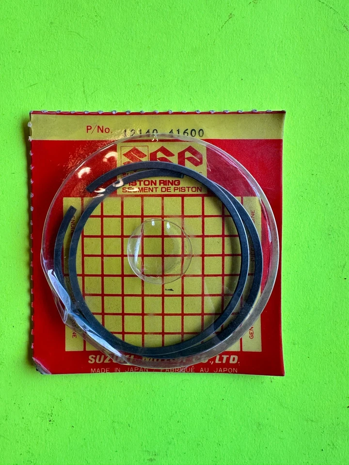 JUEGO DE ANILLOS DE PISTÓN SUZUKI 1977-81 PE250 1977-78 RM250 RS250 12140-41600 NOS OEM Foto 1 de 1