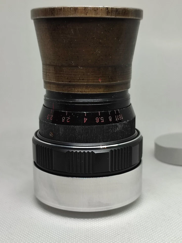 Lente de cine vintage soviética LOMO OKC OKS 1-75-1 f/2 75 mm URSS M42 Foto 1 de 4