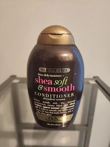 Champú OGX Frizz Defy/Humedad + Karité Suave y Suave 13 Oz. - Imagen 1 de 2