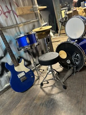 drum set with electric guitar used - Image 1 of 4