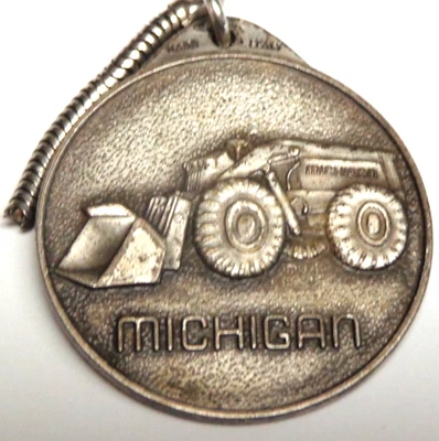 Michigan Loader, The Island Supply Co., Grand Island, NE, llavero/llavero de reloj Foto 1 de 2