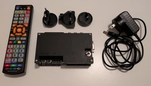 OSSC 1.6 With Remote, Power Adapters - Picture 1 of 2