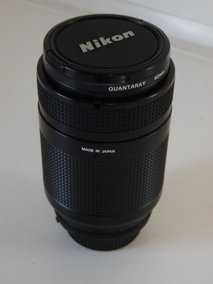Vintage Nikon AF Nikkor 70-210mm 1:4-5.6 Zoom Lens with covers - Image 1 of 4