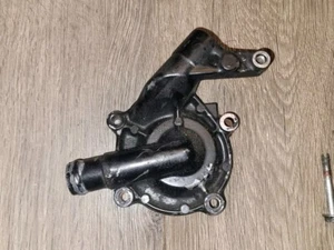 1985 1986 HONDA SHADOW VT1100C ENGINE WATER PUMP COOLANT COVER OEM BLACK W Bolts - Picture 1 of 6